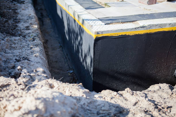Professional Waterproofing technician working in Trenton, MI